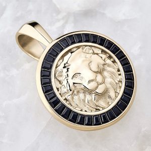 dije ref Leon Gemas Negras en oro laminado